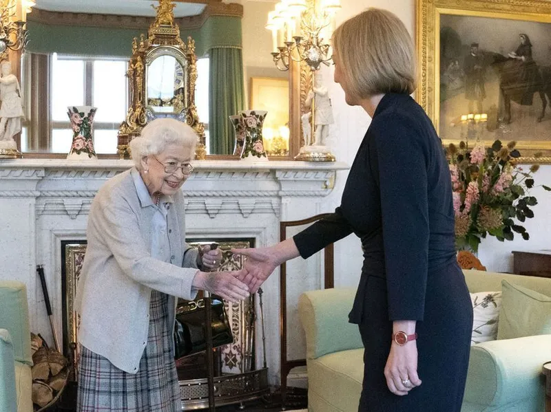 Britain's Queen Elizabeth II welcomes Liz Truss during an audience at Balmoral, Scotland. (Jane Barlow/Pool Photo via AP)
